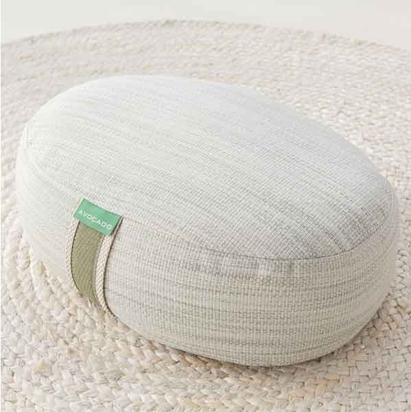 Yoga pillow on circular mat