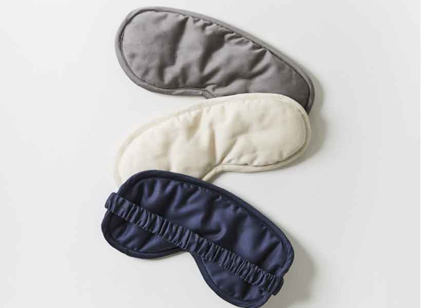 3 eye masks laying on a white background