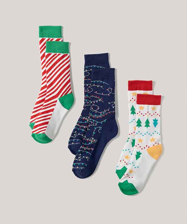 3 Pairs of Holiday Socks on White Background