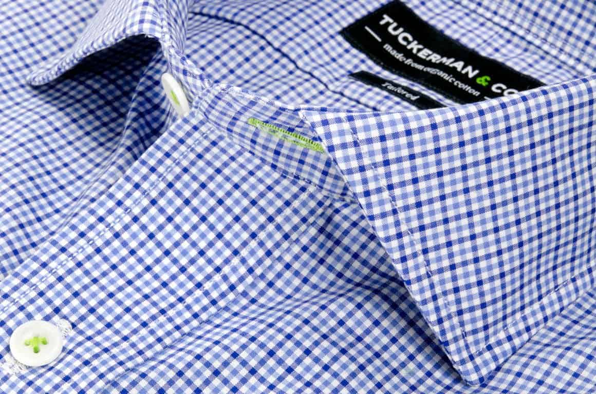 Close up of blue checkered men's button down t-shirt
