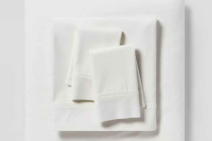 Image of white sheets and pillow covers