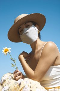 woman with organic cotton face mask