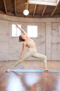 woman doing yoga in Synergy yoga activewear