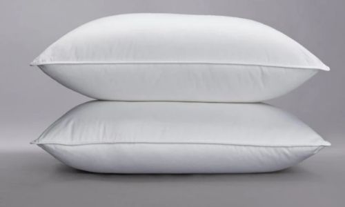 2 white Sol Organic pillows stacked on top of each other