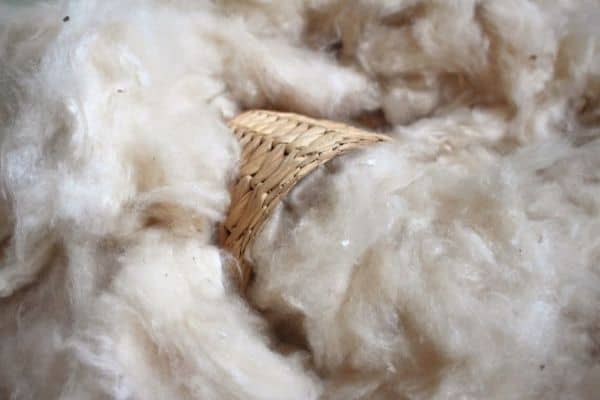 natural cotton fiber in and around a basket
