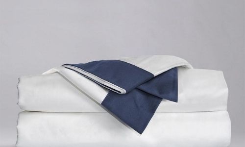 White and navy organic bedsheets