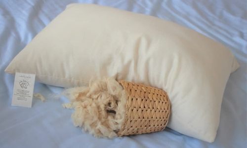 organic pregnancy body pillow with a basket of natural kapok