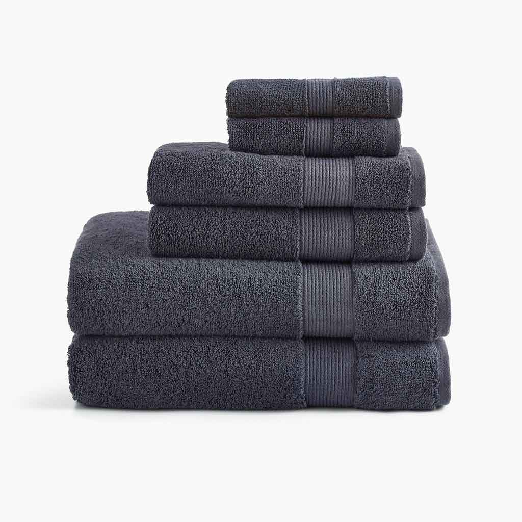 Under the Canopy Towels in Charcoal stacked on top of each other
