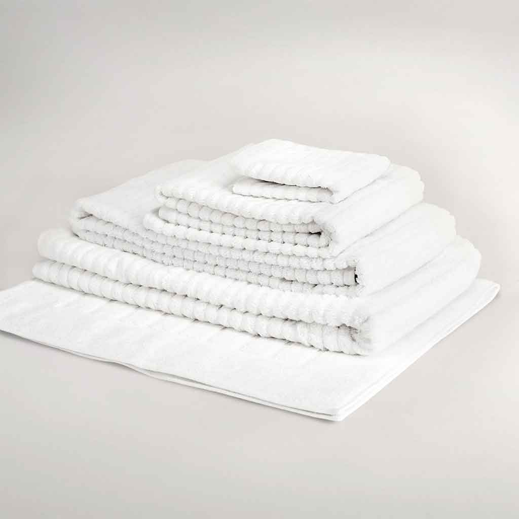 Lifekind Organic Towels - White towels stacked on top of each other